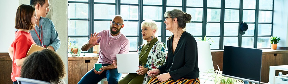 Diverse team brainstorming in bright and relaxed office space